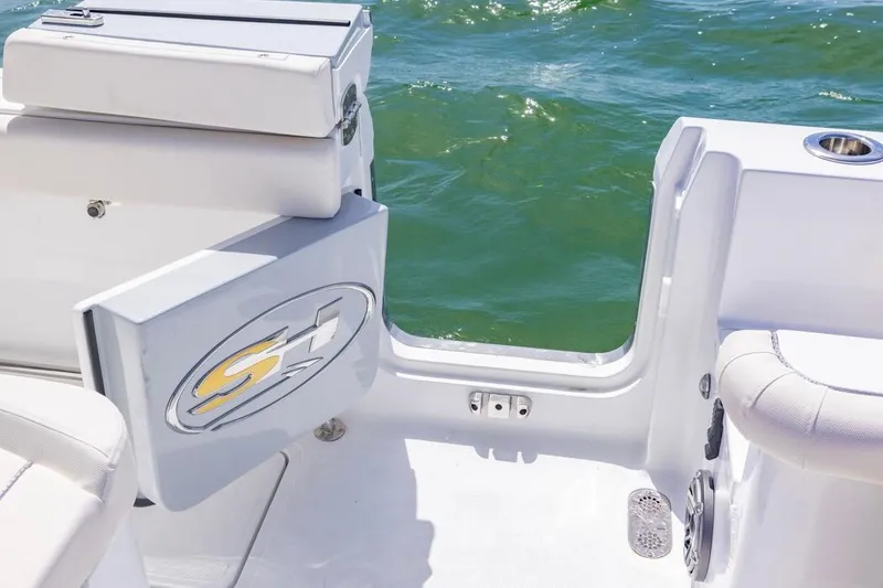 Slide: The Image of 2026 Sea Hunt Gamefish 27 boat with open side door, ocean view. - 16