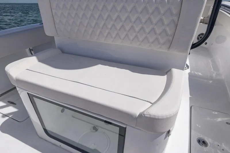 Slide: The Image of 2026 Sea Hunt Gamefish 27 Forward Seating with cushioned bench and storage compartment. - 17