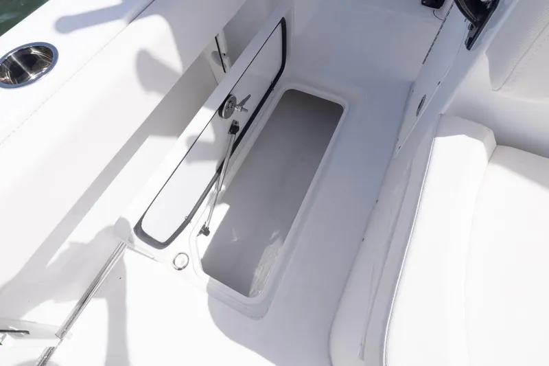 Slide: The Image of 2026 Sea Hunt Gamefish 27 Forward Seating storage compartment detail. - 19