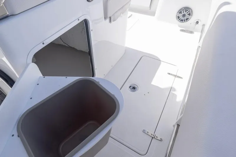 Slide: The Image of Interior of 2026 Sea Hunt Gamefish 27, featuring forward seating and storage compartments. - 20