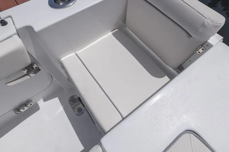 Slide: The Image of 2026 Sea Hunt Gamefish 27 Forward Seating, white cushioned boat seat detail. - 24