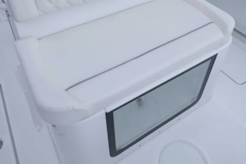 Slide: The Image of 2026 Sea Hunt Gamefish 27 Coffin Box with cushioned seating and storage. - 15