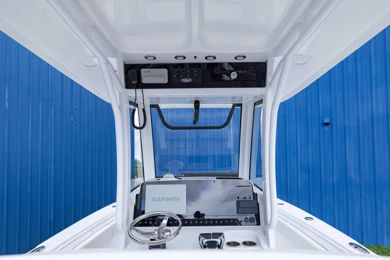 Slide: The Image of 2026 Sea Hunt Gamefish 27 Coffin Box boat console with Garmin navigation system. - 17