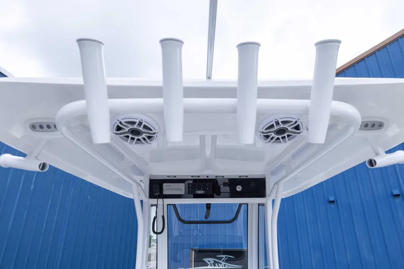 Slide: The Image of 2026 Sea Hunt Gamefish 27 Coffin Box boat with rod holders and speakers. - 18