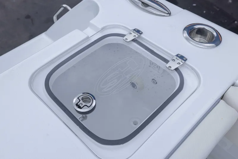 Slide: The Image of 2026 Sea Hunt Gamefish 27 Coffin Box with secure latch and cup holders. - 22