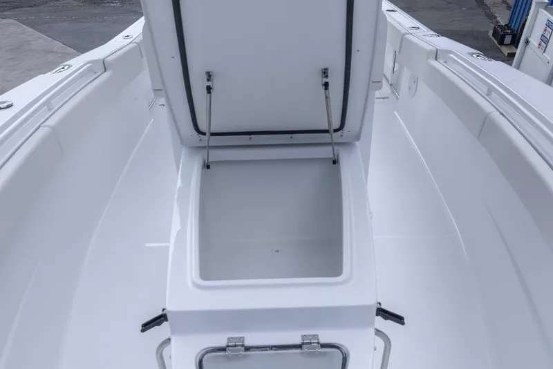 Slide: The Image of 2026 Sea Hunt Gamefish 27 Coffin Box open, showcasing spacious storage compartment. - 9