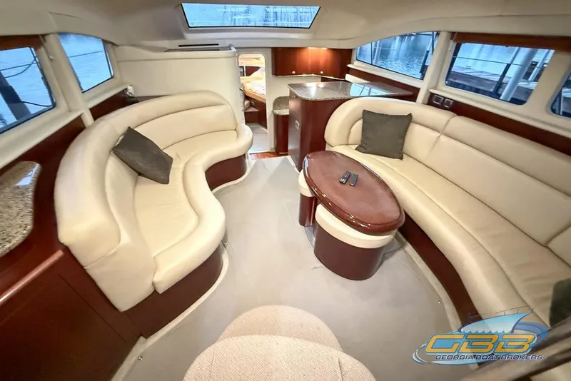 Slide: The Image of Luxurious interior of 2006 Sea Ray 40 Motor Yacht with plush seating and elegant design. - 10