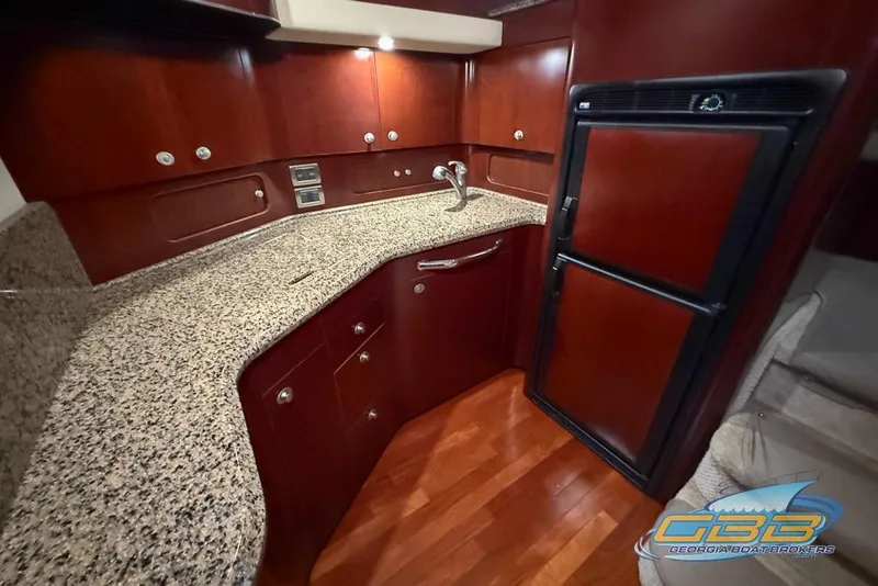 Slide: The Image of Luxurious kitchen interior of 2006 Sea Ray 40 Motor Yacht with granite countertops. - 14