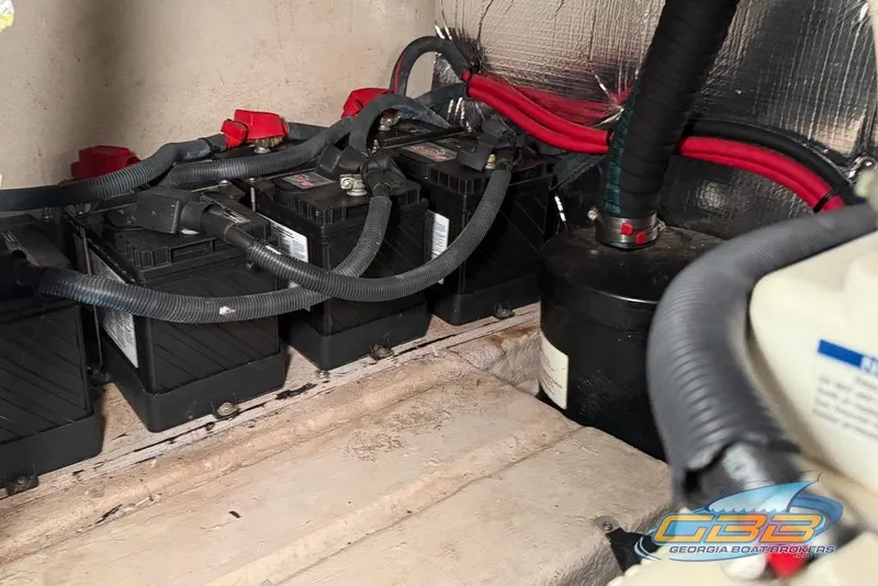 Slide: The Image of Battery compartment of a 2006 Sea Ray 40 Motor Yacht with wiring and components. - 41