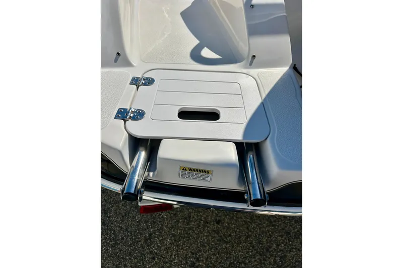 Slide: The Image of 2004 Starcraft Aurora 2000 OB boat swim platform with foldable ladder. - 12