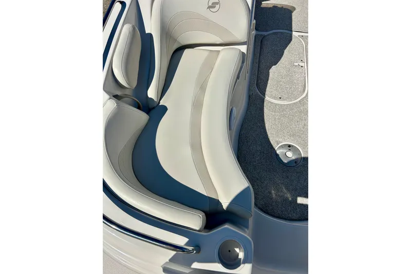 Slide: The Image of 2004 Starcraft Aurora 2000 OB boat interior with cushioned seating and carpeted floor. - 19