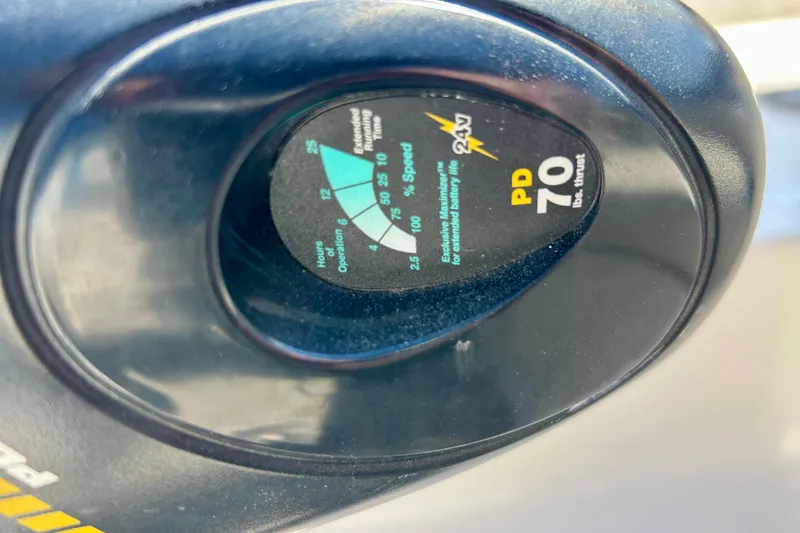 Slide: The Image of Close-up of a Starcraft Aurora 2000 OB 2004 boat control panel, showing speed and thrust indicators. - 25