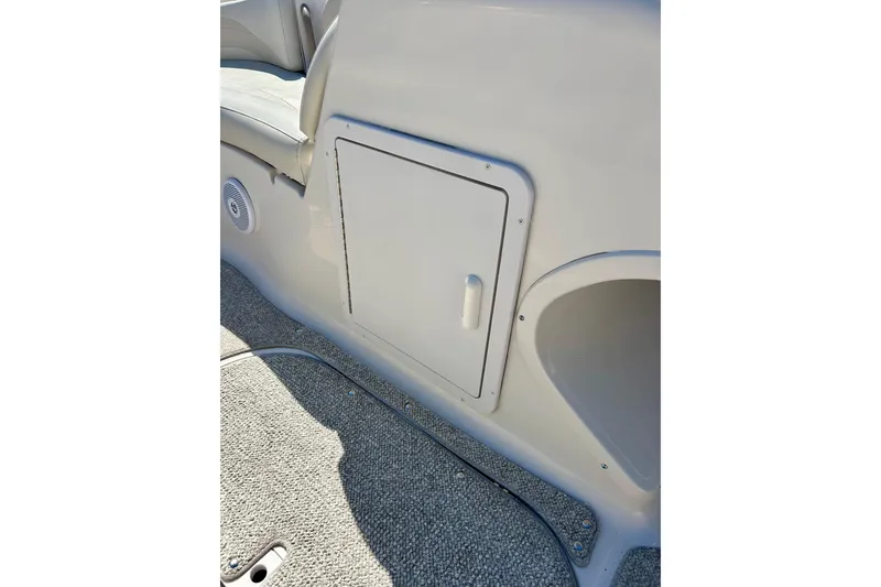 Slide: The Image of 2004 Starcraft Aurora 2000 OB boat interior storage compartment and seating area. - 38