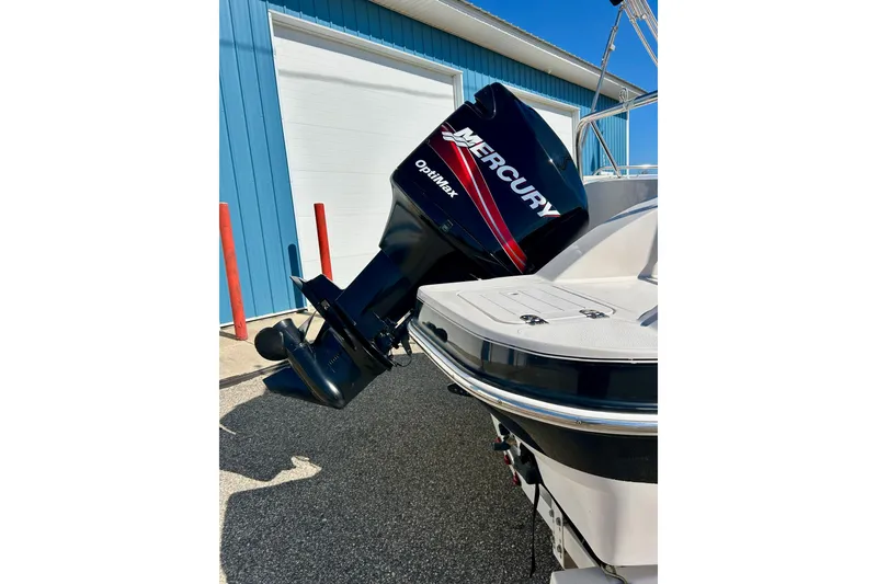 Slide: The Image of 2004 Starcraft Aurora 2000 OB boat with Mercury Optimax outboard motor. - 8