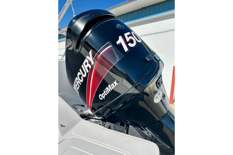 Slide: The Image of Mercury OptiMax 150 engine on 2004 Starcraft Aurora 2000 OB boat. - 9