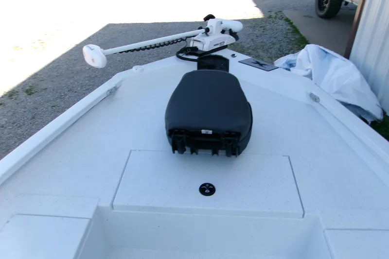 Slide: The Image of 2026 Xpress H22B Bay boat deck with trolling motor and seat. - 15
