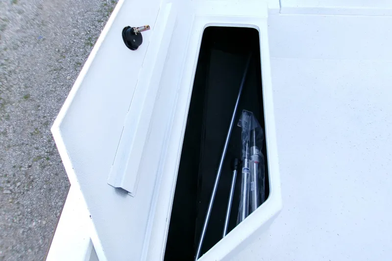 Slide: The Image of Storage compartment of 2026 Xpress H22B Bay boat with equipment inside. - 19