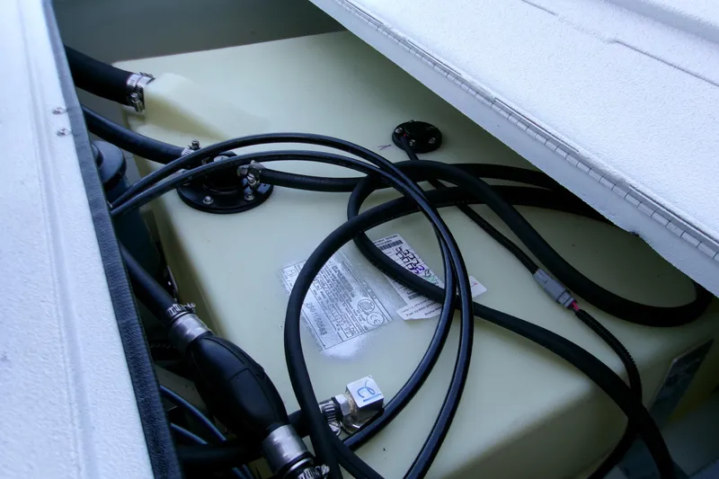 Slide: The Image of Fuel tank and hoses inside 2026 Xpress H22B Bay boat. - 20