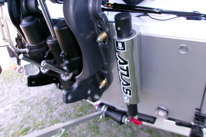 Slide: The Image of Close-up of 2026 Xpress H22B Bay boat engine components and hydraulic system. - 3