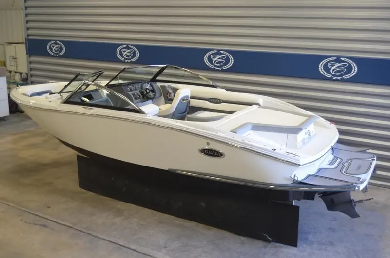 The Image of 2017 Cobalt CS1 boat in storage rack, side view. - 1