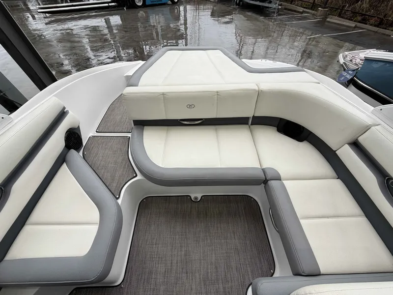 Slide: The Image of Interior of a 2017 Cobalt CS1 boat with gray and white seating. - 12