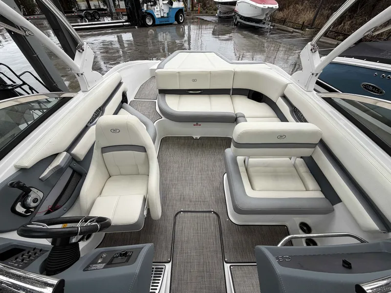 Slide: The Image of Interior of a 2017 Cobalt CS1 boat with white seating. - 15