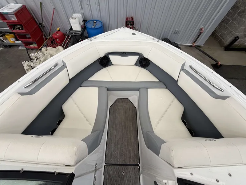 Slide: The Image of Interior of a 2017 Cobalt CS1 boat with white seating. - 16