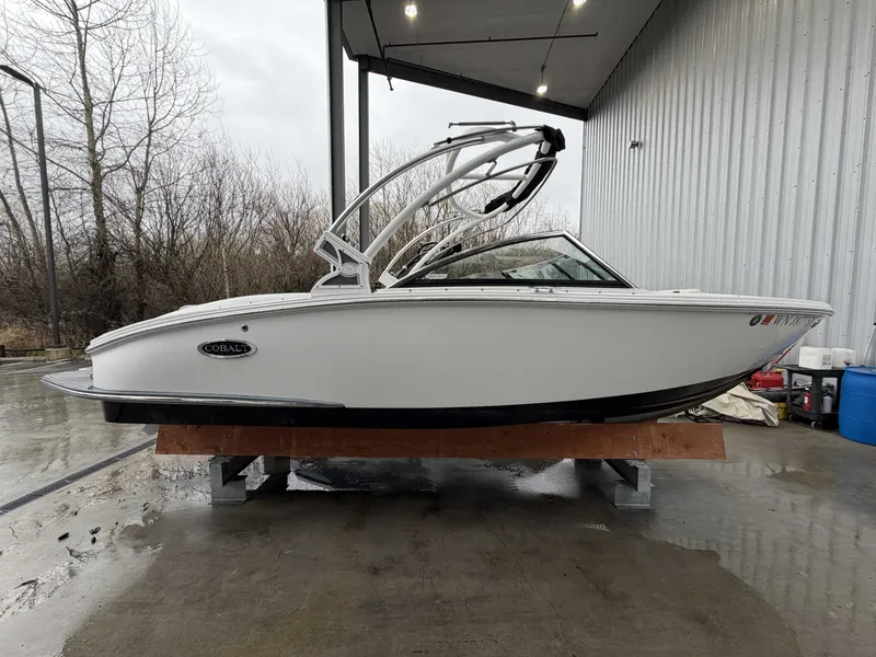Slide: The Image of 2017 Cobalt CS1 boat on a wet dock. - 5
