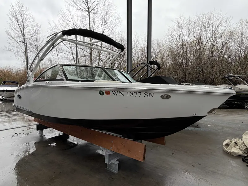 Slide: The Image of 2017 Cobalt CS1 boat on an outdoor dock. - 6