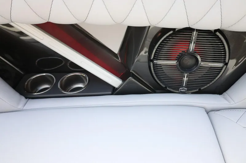 Slide: The Image of 2022 Tigé 23ZX boat interior with speaker and cup holders. - 20