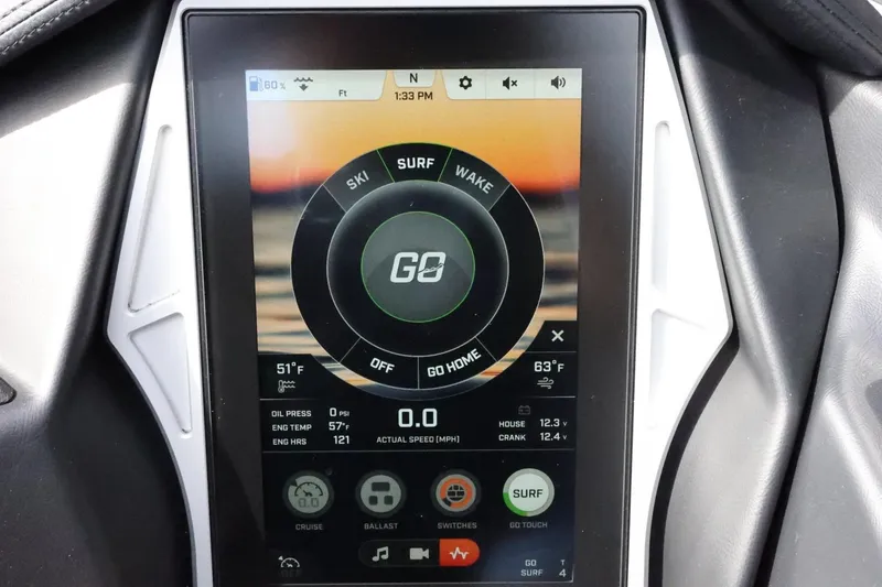 Slide: The Image of 2022 Tigé 23ZX touchscreen display showing ski, surf, and wake options. - 27