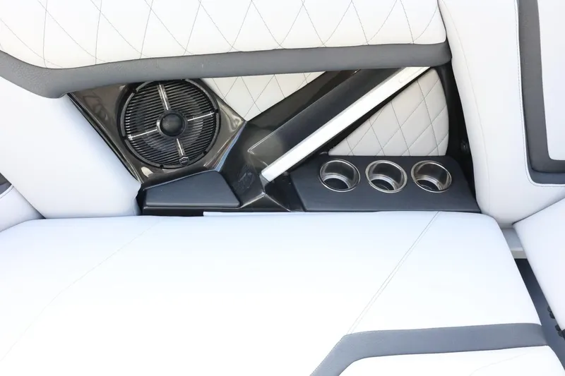 Slide: The Image of 2022 Tigé 23ZX boat interior with speaker and cup holders. - 41