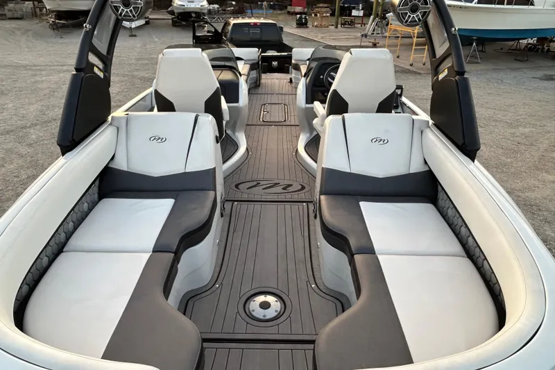 Slide: The Image of 2023 Manitou 270 boat interior with luxurious seating and modern design. - 20