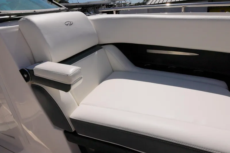 Slide: The Image of Luxurious white seating on 2017 Regal 29 OBX boat, featuring sleek design and comfort. - 3