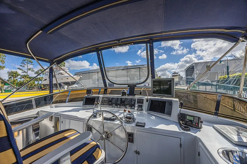 Slide: The Image of Cockpit view of 1996 Jefferson 52 Rivanna yacht with navigation equipment and steering wheel. - 18