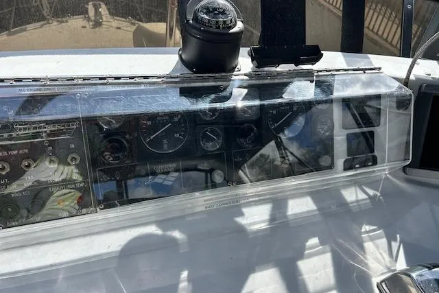 Slide: The Image of 1996 Jefferson 52 Rivanna Cockpit MY dashboard with compass and navigation instruments. - 22