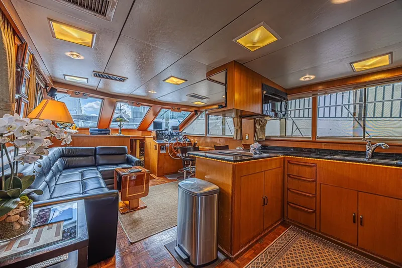 Slide: The Image of Luxurious interior of a 1996 Jefferson 52 Rivanna Cockpit MY yacht with modern amenities. - 27