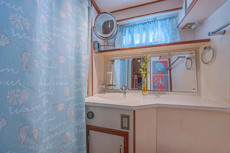 Slide: The Image of Bathroom interior of 1996 Jefferson 52 Rivanna Cockpit MY yacht with nautical decor. - 42