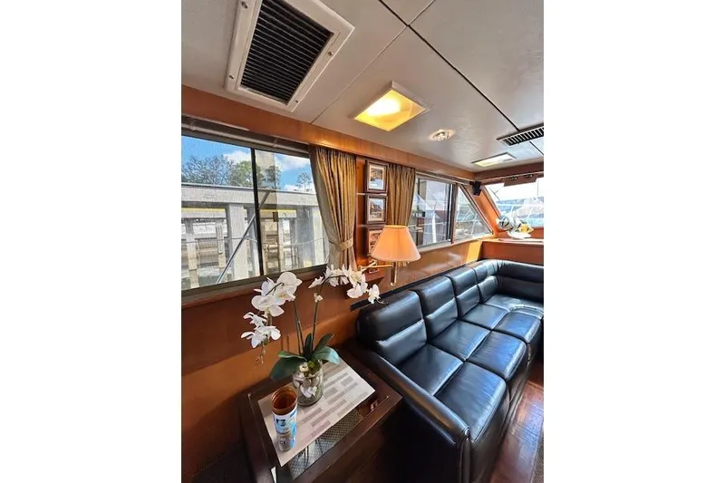 Slide: The Image of Luxurious interior of 1996 Jefferson 52 Rivanna Cockpit MY yacht with leather seating. - 55