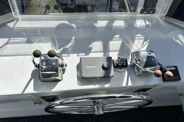 Slide: The Image of Control panel of a 1996 Jefferson 52 Rivanna Cockpit MY yacht with steering wheel. - 23