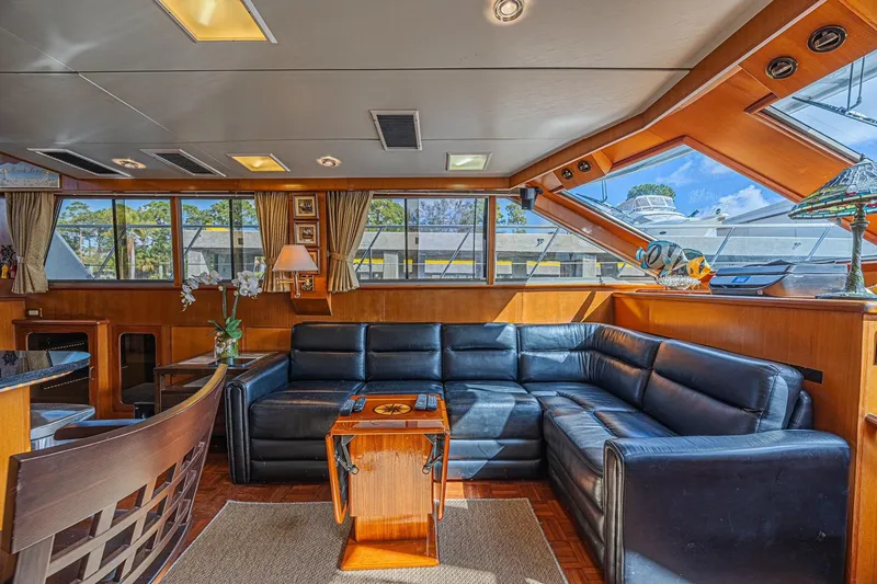 Slide: The Image of Luxurious interior of 1996 Jefferson 52 Rivanna Cockpit MY yacht with leather seating. - 26