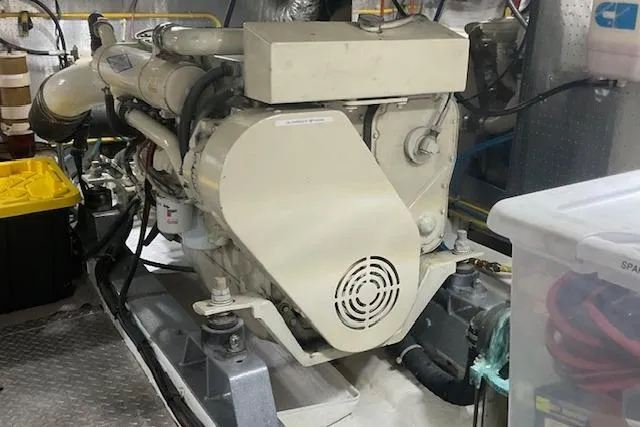 Slide: The Image of Engine room of 1996 Jefferson 52 Rivanna Cockpit MY yacht, featuring a well-maintained engine. - 69