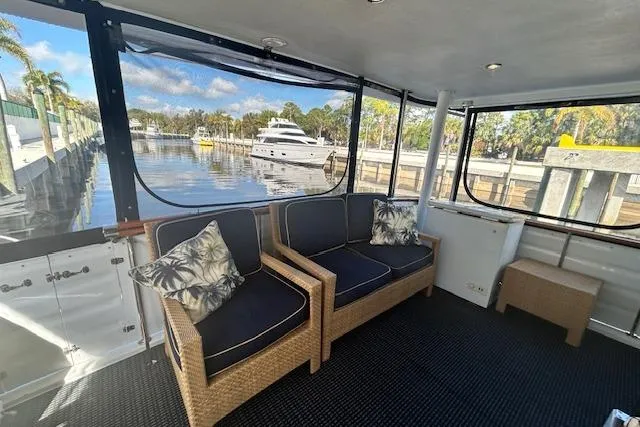 Slide: The Image of Interior of 1996 Jefferson 52 Rivanna Cockpit MY yacht with waterfront view. - 9