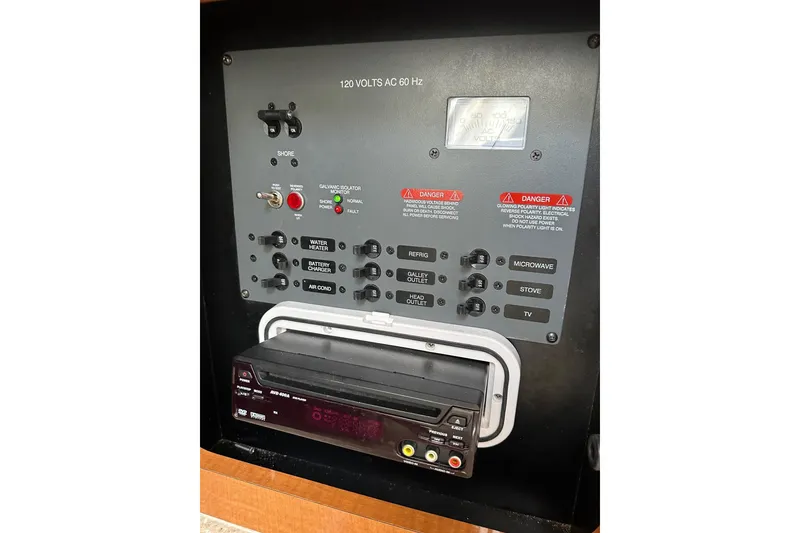 Slide: The Image of Electrical control panel of 2007 Robalo R305 Walkaround boat with various switches and indicators. - 29