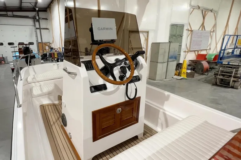 Slide: The Image of Manufacturer Provided Image: Interior of 2026 Metan Davenport 17 boat with Garmin navigation system. - 4