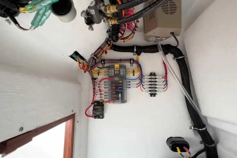 Slide: The Image of Manufacturer Provided Image: Electrical wiring setup in 2026 Metan Pelham Bay 21 Special Edition boat. - 5