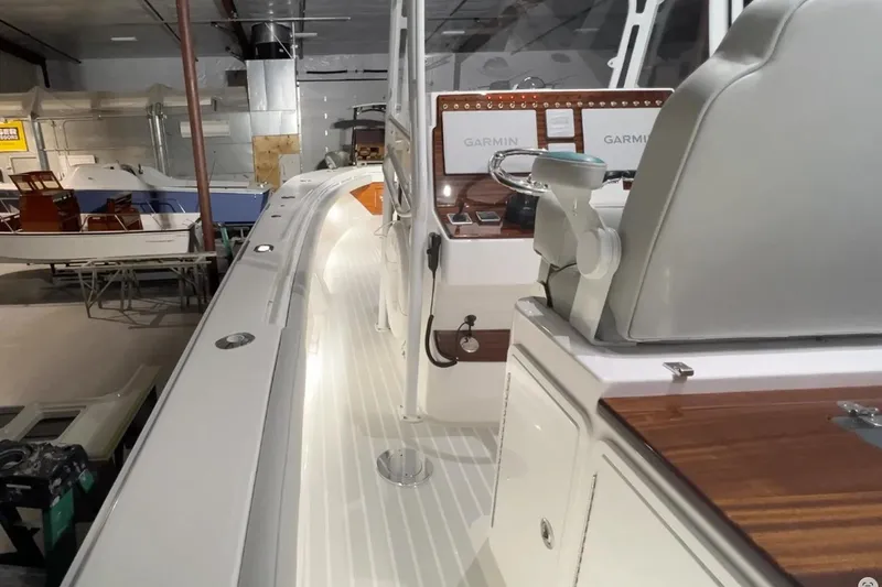 Slide: The Image of Manufacturer Provided Image: Interior view of 2026 Metan Glen Cove 32 boat with Garmin navigation system. - 3