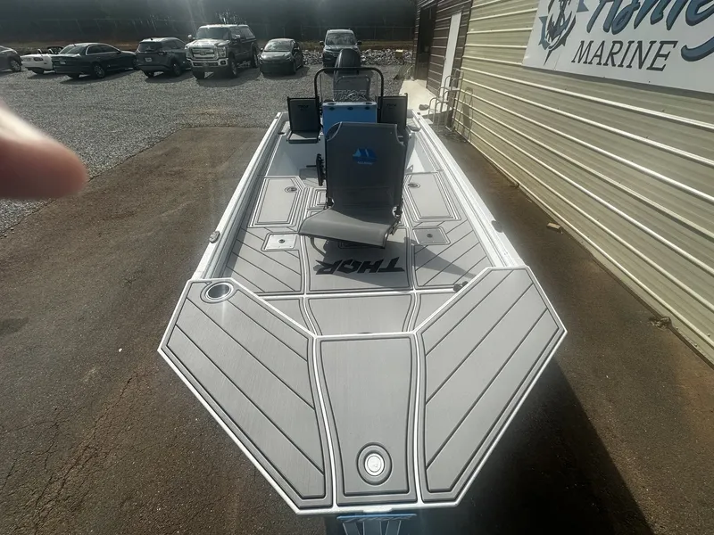 Slide: The Image of Thor LAKE HAMMER 1900 CC boat, 2026 model, parked outside. - 5