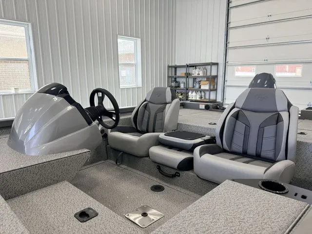 Slide: The Image of Interior of 2026 Yamaha Boats SPSMN 1710PFX 2026 VNL with modern seating. - 11