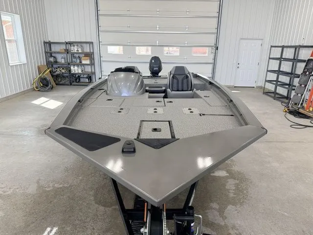 Slide: The Image of Yamaha Boats SPSMN 1710PFX 2026 VNL in a garage. - 2